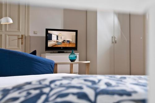 アパルタメンティ  ポマランクザルニーアにあるテレビまたはエンターテインメントセンター