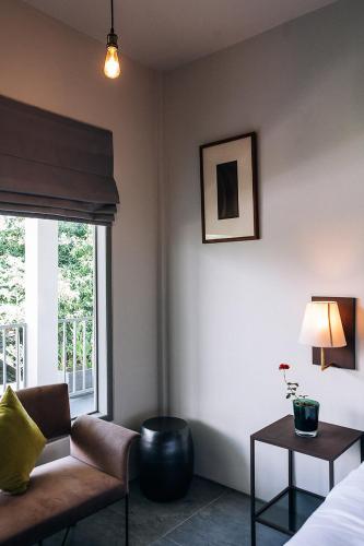 Ένα ή περισσότερα κρεβάτια σε δωμάτιο στο Lovinalife Room & Cafe