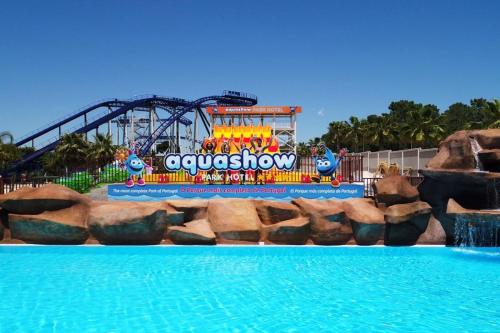 a view of a water park with a roller coaster at Hello Chloé in Vilamoura