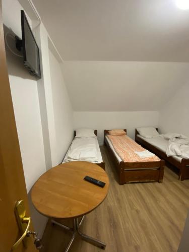 Łóżko lub łóżka w pokoju w obiekcie Motel S7