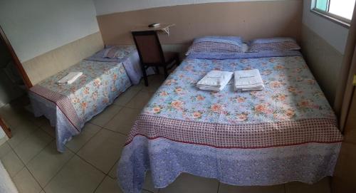 Katil atau katil-katil dalam bilik di Hotel New