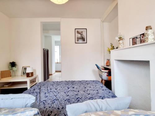 Posteľ alebo postele v izbe v ubytovaní Apartement Lille
