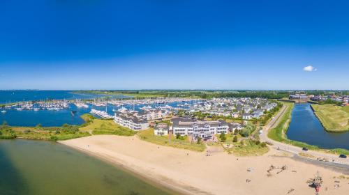 an aerial view of a resort on a beach at Beachhotel Cape Helius in Hellevoetsluis