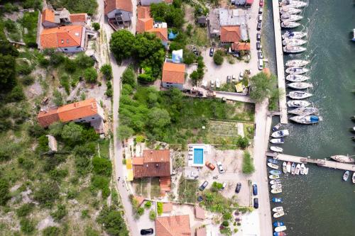 an aerial view of a marina with boats at Mila and Jurija Formenti 2 apartments in heart of nautic marina, with heated swimming pool, bikes, Sup, kajak in Skradin
