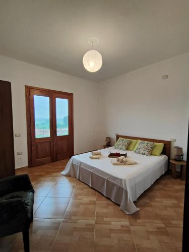 Postel nebo postele na pokoji v ubytování Villa Apollonia Guest House