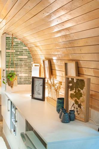 a room with a counter with a wooden ceiling at Grand Daddy Boutique Hotel in Cape Town
