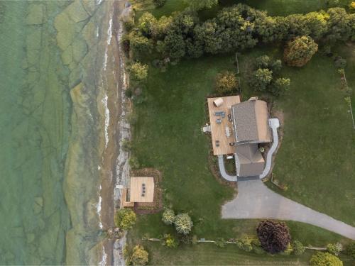 an overhead view of a house in a yard at The Hull House - Lake Ontario Waterfront w Sauna in Wellington