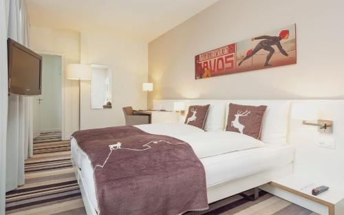 Cama o camas de una habitación en Hotel National by Mountain Hotels