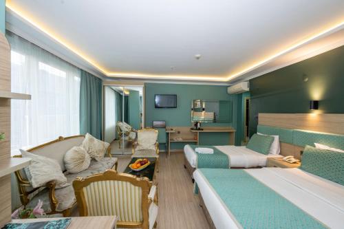 Ένα ή περισσότερα κρεβάτια σε δωμάτιο στο The Hotel Ottoman City Istanbul