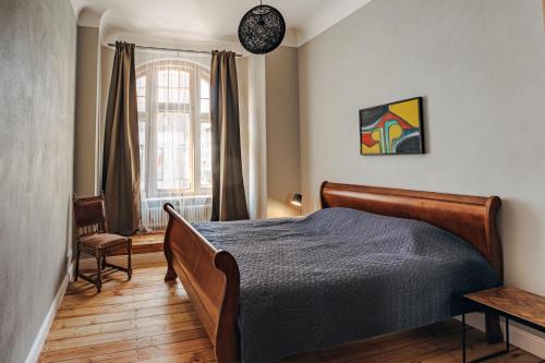 Constantine Apartments tesisinde bir odada yatak veya yataklar