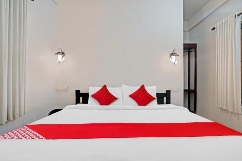 A bed or beds in a room at Flagship Cherai Panoramic Beach Hotel