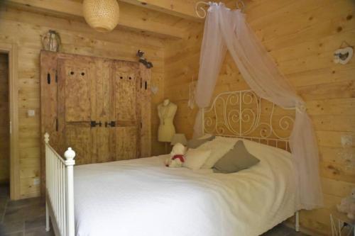 Katil atau katil-katil dalam bilik di Chalet : le moulin du sagard