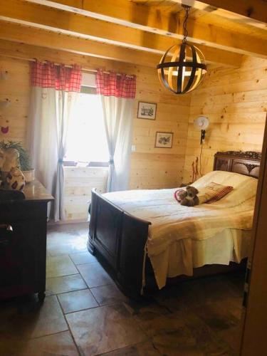 Katil atau katil-katil dalam bilik di Chalet : le moulin du sagard