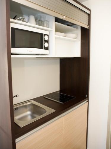 Η κουζίνα ή μικρή κουζίνα στο Hotel Residence Alaïa