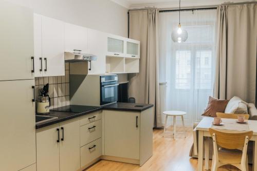 Kuchyň nebo kuchyňský kout v ubytování Apartamenty Optimal
