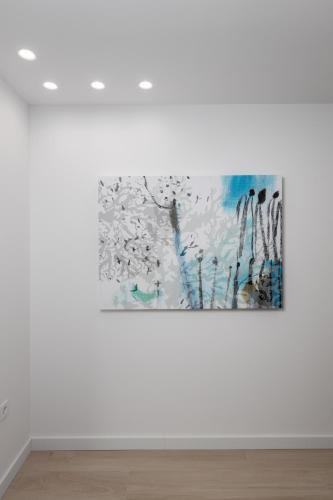 a painting on a wall in a white room at HADRIE LUXURY RESORT AND VILLAS Krk in Krk