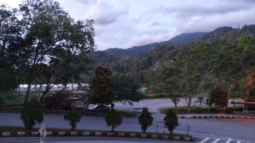 a view of a river with mountains in the background at Gohtong Jaya in Genting Highlands