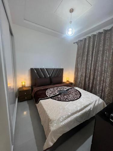 Katil atau katil-katil dalam bilik di Appartement Irena neuf à 5 min de la plage