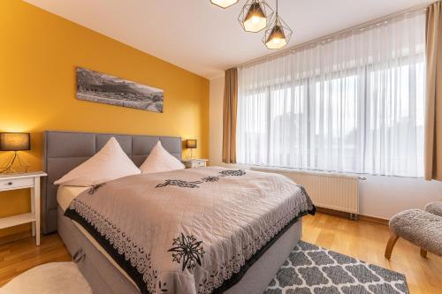 Apartamenty Geigerにあるベッド