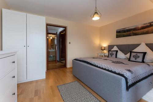 Apartamenty Geigerにあるベッド