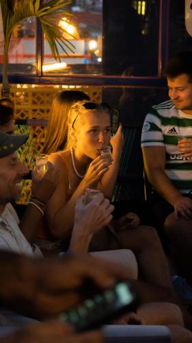 a group of people sitting on a bus at Hotel Suculenta Boutique in San Cristóbal de Las Casas