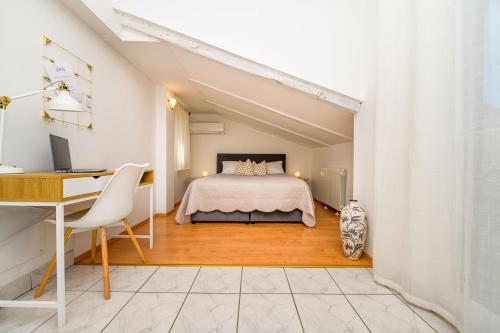Postel nebo postele na pokoji v ubytování House Rosa