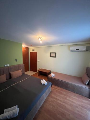 Postel nebo postele na pokoji v ubytování Villa Dionis