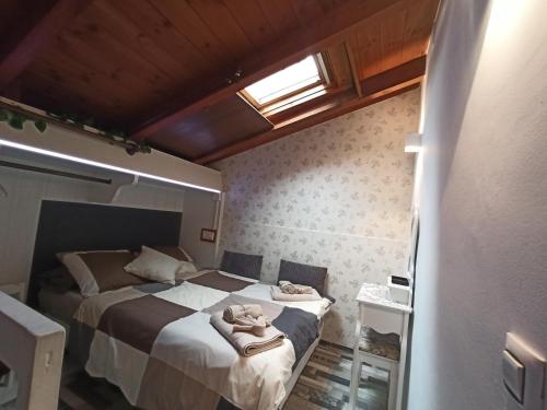 Postel nebo postele na pokoji v ubytování La Casita