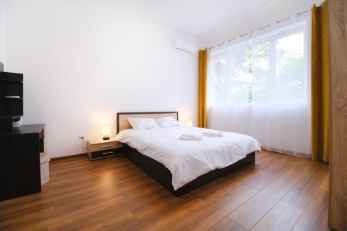 Voodi või voodid majutusasutuse Apartment in the city center toas