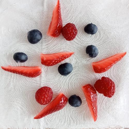 a face made out of fruit and berries on a towel at SANTINO'S HOUSE in Peveragno