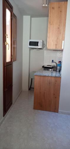 Kuchyň nebo kuchyňský kout v ubytování Coqueto Estudio 2