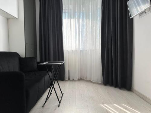 Khu vực ghế ngồi tại Квартира по вул. Огієнка 2а