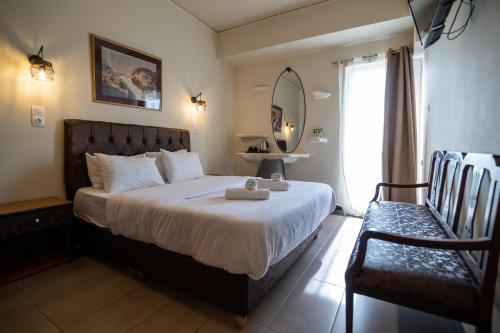 Postel nebo postele na pokoji v ubytování Votsalakia Hotel & Luxury Apartments