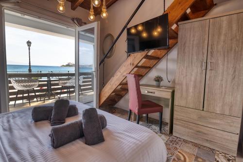 Postel nebo postele na pokoji v ubytování Votsalakia Hotel & Luxury Apartments