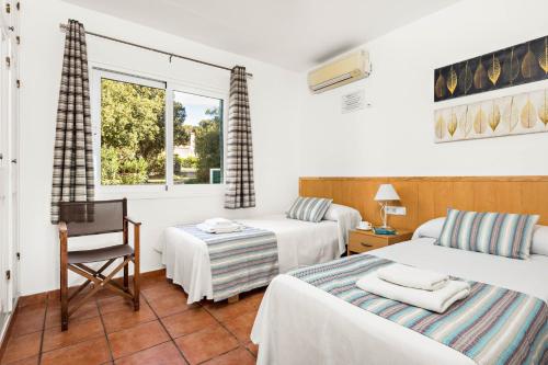 Lova arba lovos apgyvendinimo įstaigoje Villa Olives by Villa Plus