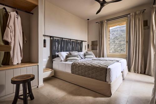 Postel nebo postele na pokoji v ubytování Apsila Pool Suites