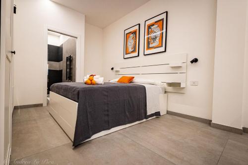 Ένα ή περισσότερα κρεβάτια σε δωμάτιο στο Sikelia Apartments