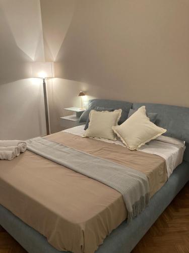 Ένα ή περισσότερα κρεβάτια σε δωμάτιο στο Casa vacanze Monroe