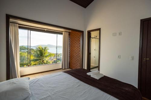 Ένα ή περισσότερα κρεβάτια σε δωμάτιο στο Bz20 Geribá com vista panorâmica! 6 quartos