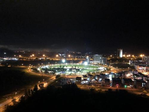 a city lit up at night with street lights at Allure - Casa Kayangan Meru Ipoh by GOSWELL in Ipoh