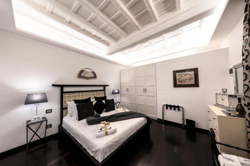 Barcaccia Luxury Suites 객실 침대