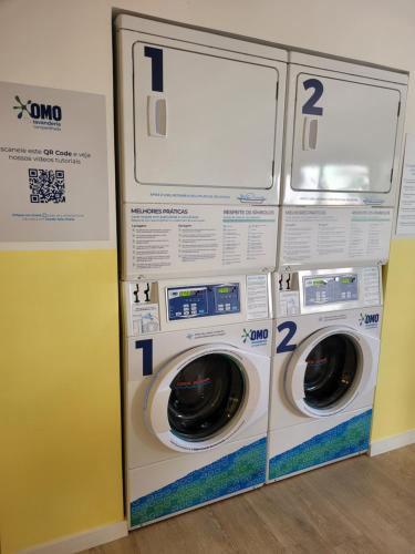 two washing machines sitting next to each other at Bewiki in Florianópolis