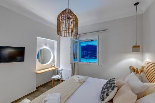 Postel nebo postele na pokoji v ubytování Villa Mare Syros