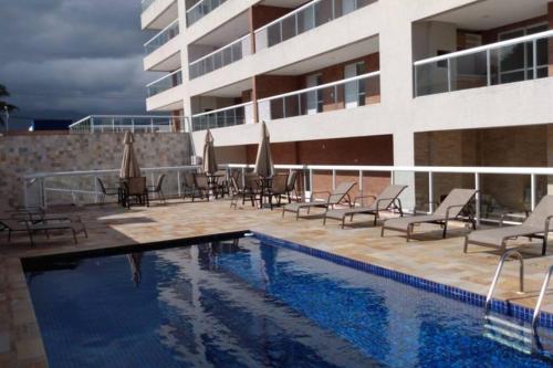 Apto. com varanda gourmet e piscina aquecidaの敷地内または近くにあるプール
