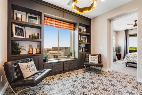 a living room with a bed and a window at Scottsdale Scenery in Scottsdale