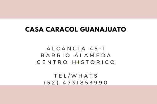 a white sans serif font with blackletters and numbers at Casa Caracol young guesthouse in Guanajuato