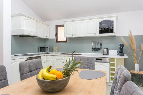 Apartments with parking space Trogir - 20874