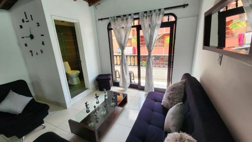 a living room with a couch and a table at apartamento en ENVIGADO in Envigado