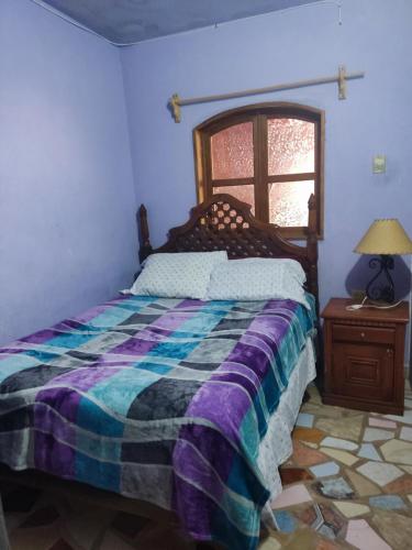 Ένα ή περισσότερα κρεβάτια σε δωμάτιο στο CASA JUANITA