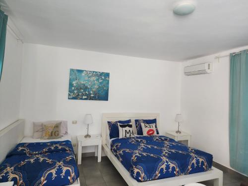Postel nebo postele na pokoji v ubytování SOL CARIBE BEACH